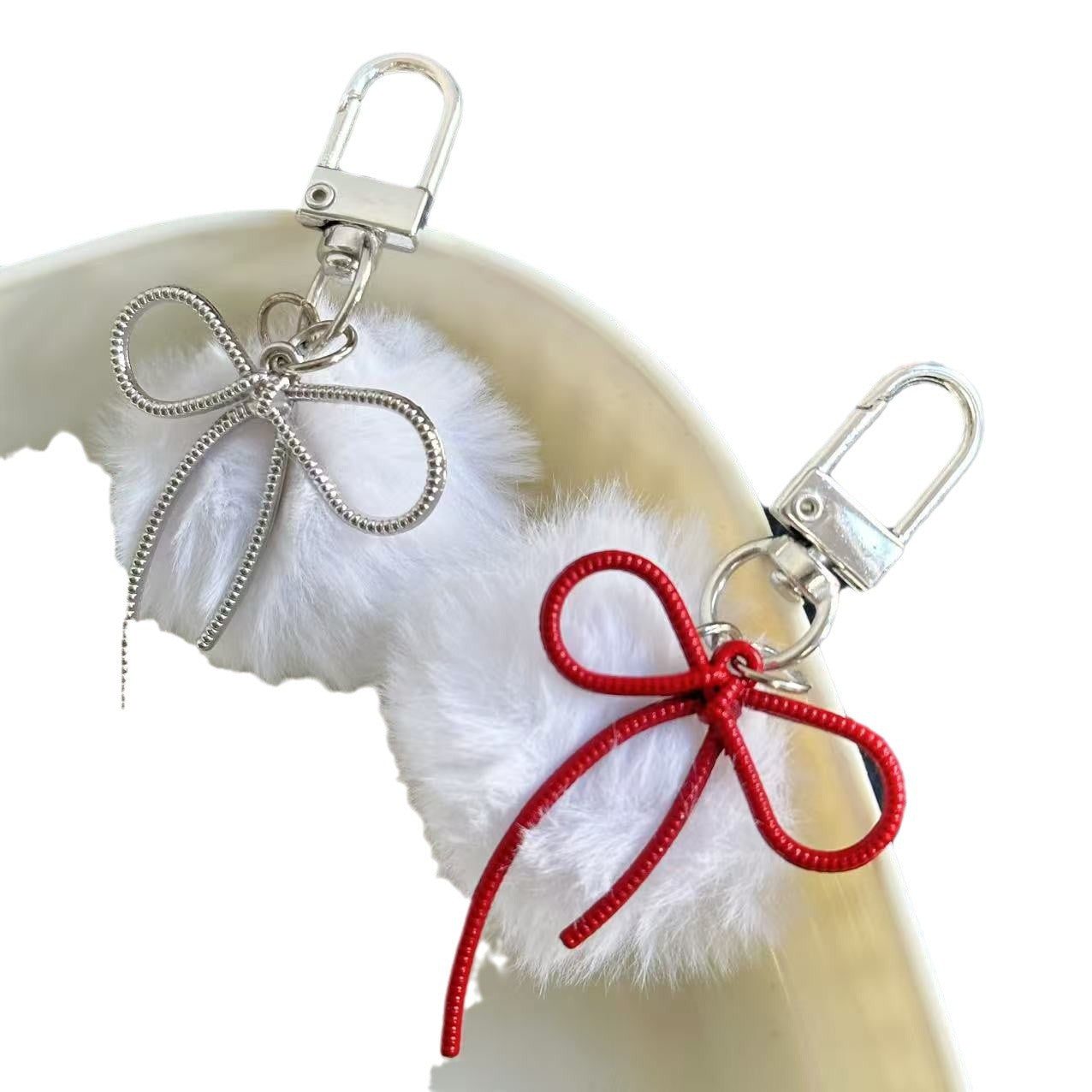 Wholesale Retro keychain with small fur ball and bow